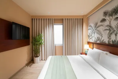 Deluxe King Room — Amana Hotel Airport